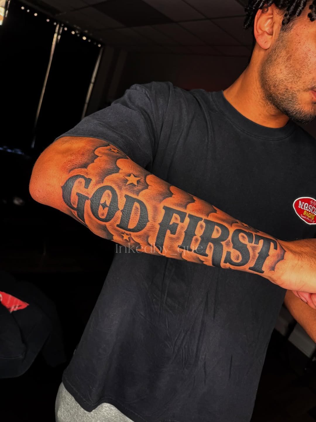 Tattoo by @inkedby_que — lettering_script, blackwork