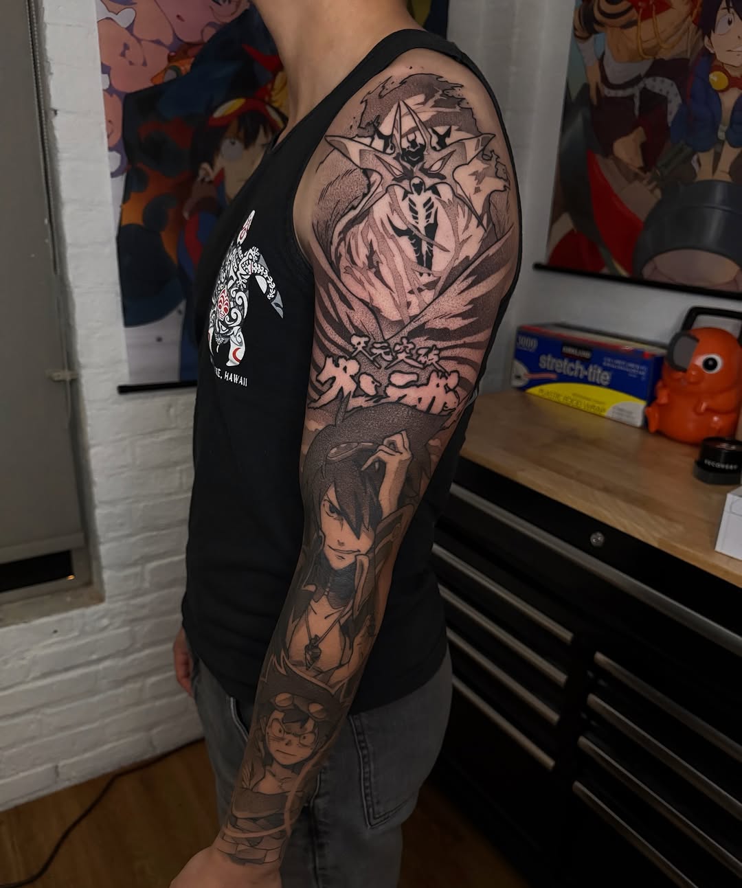 Tattoo by @z__tattoos — anime, black_and_grey