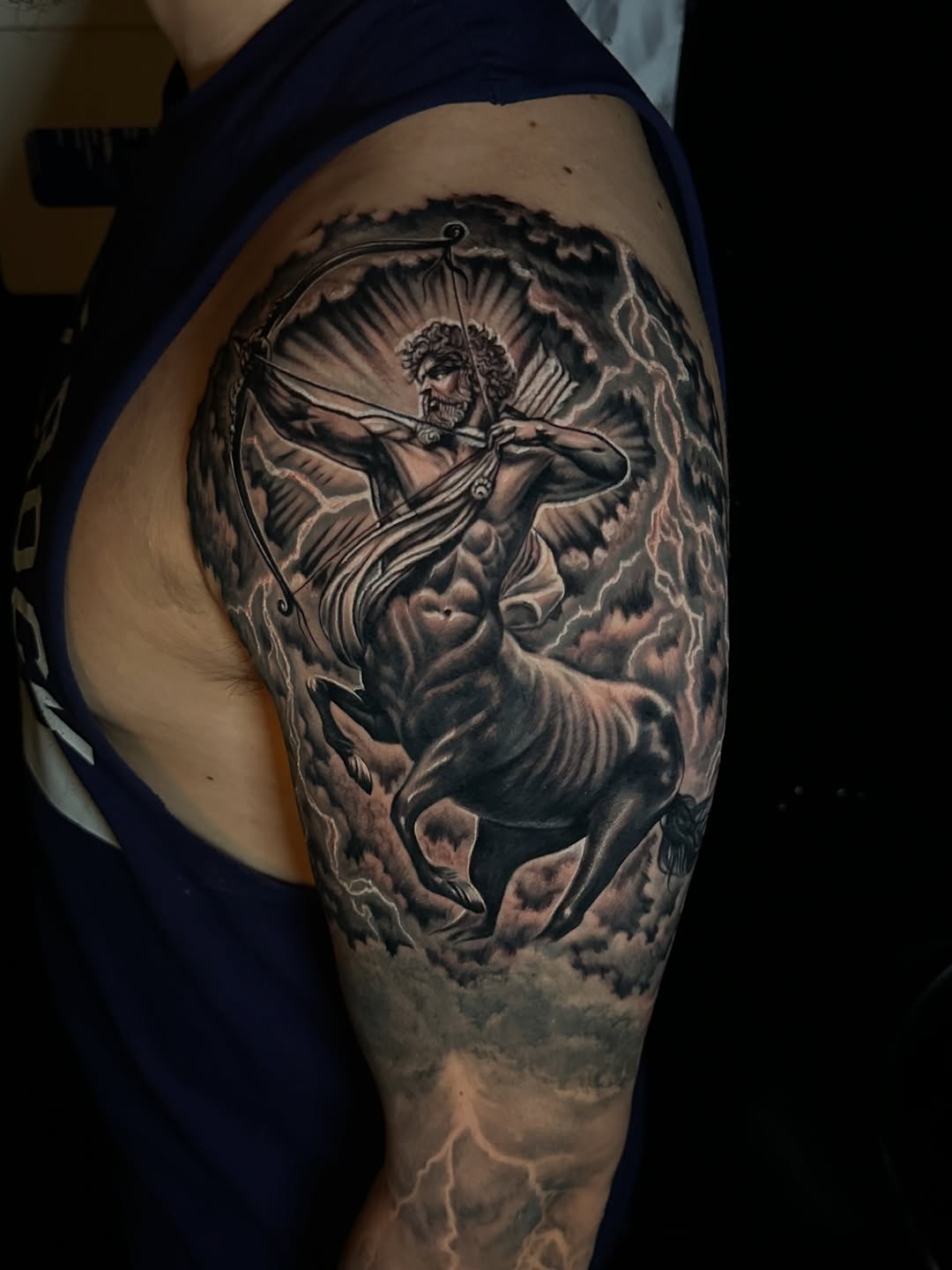 Tattoo by @sherifftattoos — realism, black_and_grey