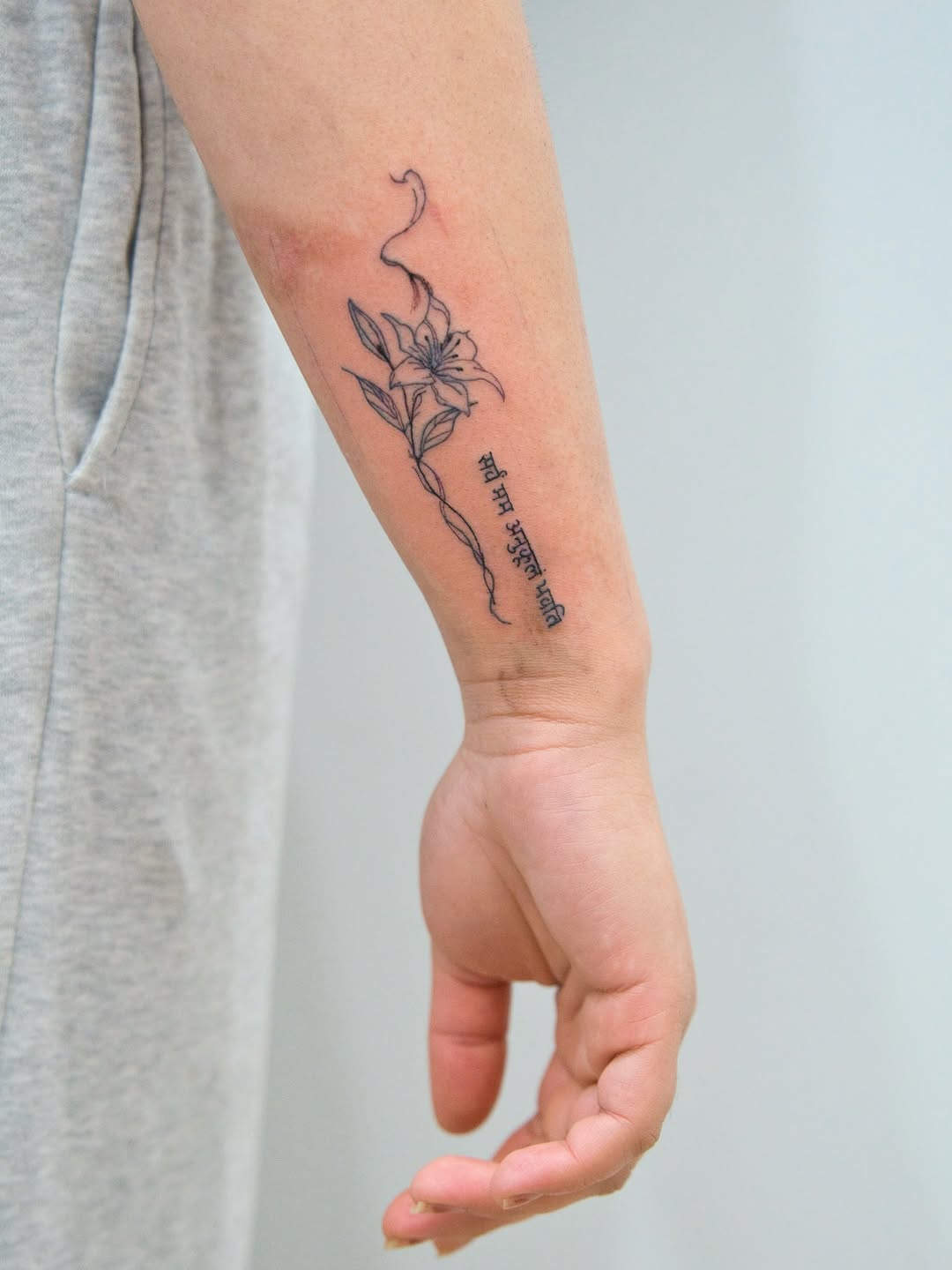 Tattoo by @wild_waves_ink — fine_line, lettering_script