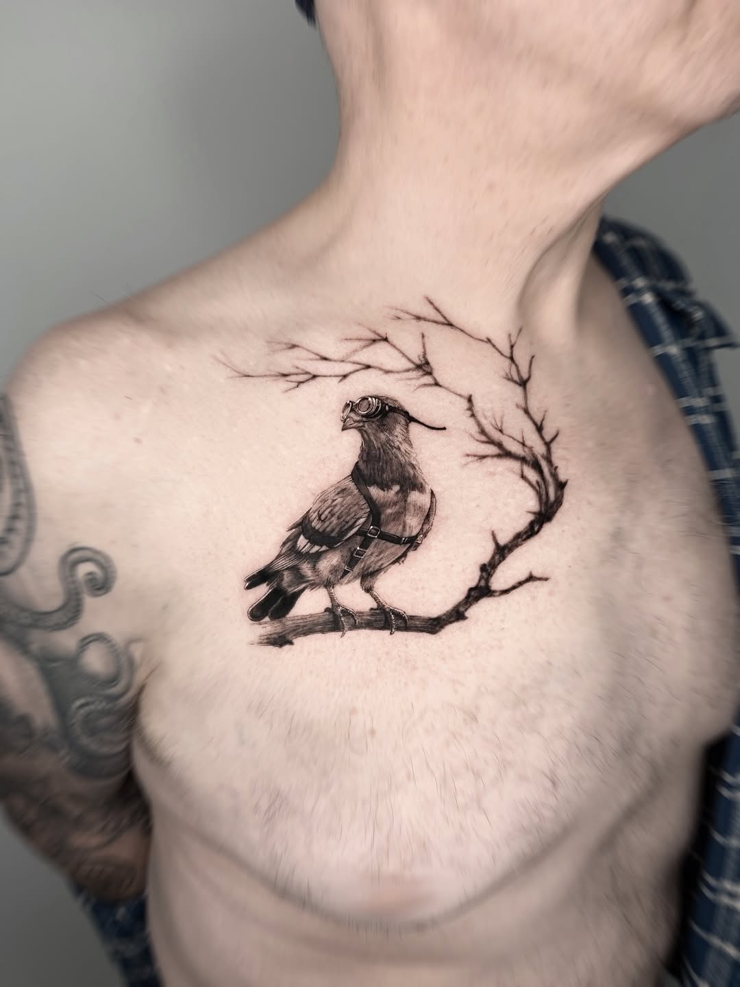 Tattoo by @tahinos.tattoo โ realism, black_and_grey