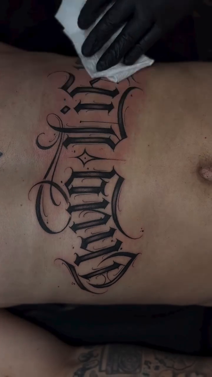 Tattoo by @tattoosbyskip — lettering_script, chicano