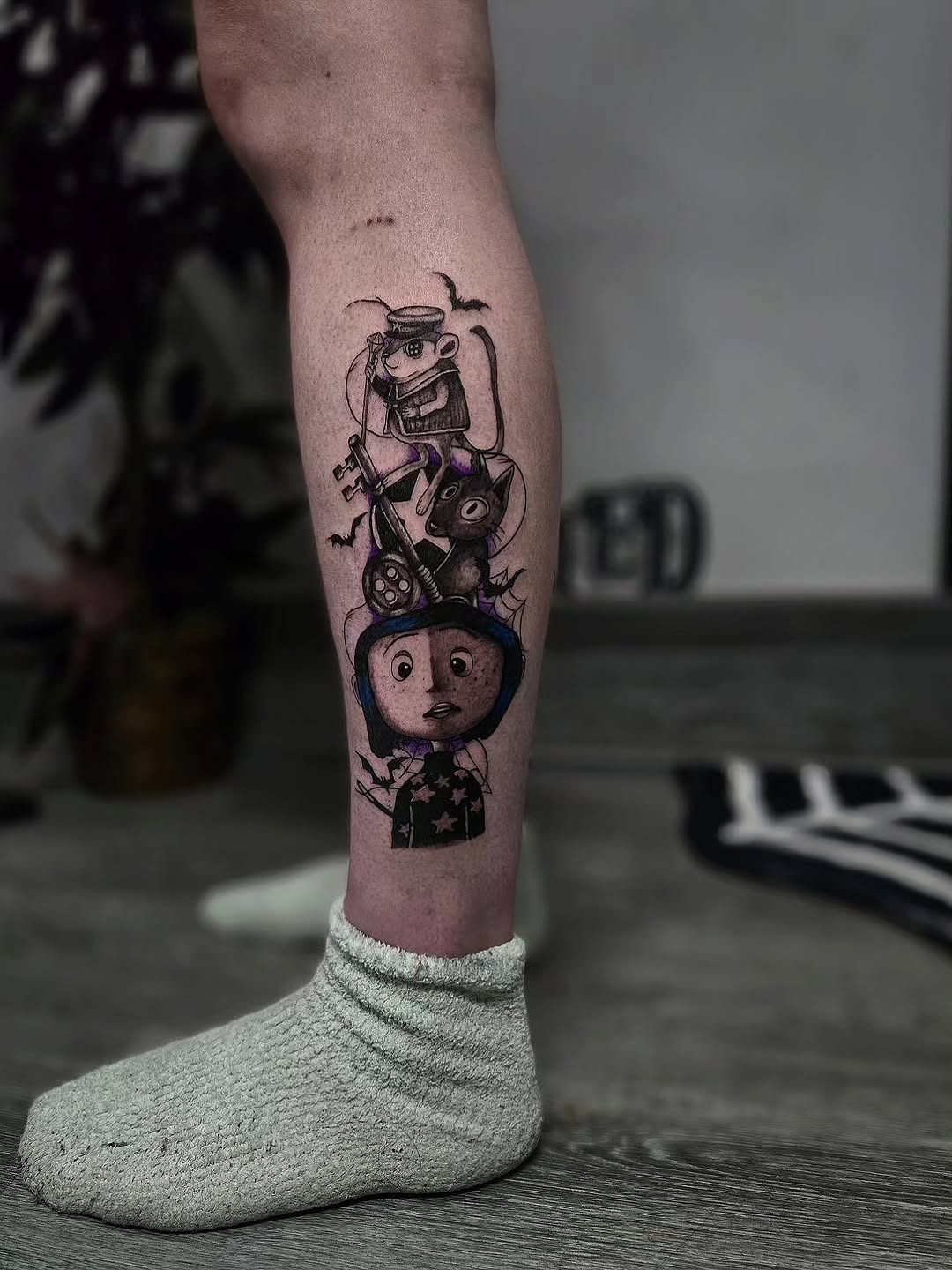 Tattoo by @grimz.ink — illustrative, black_and_grey
