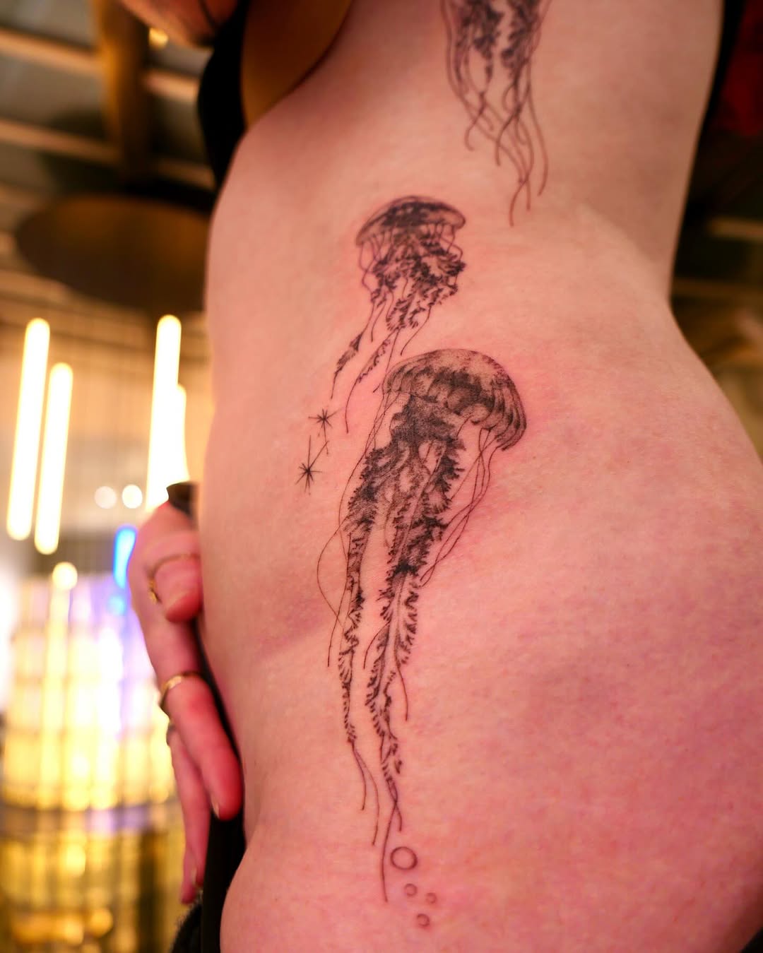 Tattoo by @dowha.tt — fine_line, black_and_grey