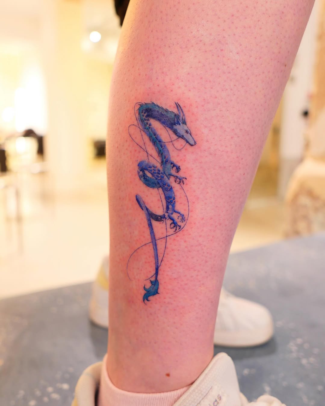Tattoo by @dowha.tt — fine_line, watercolor