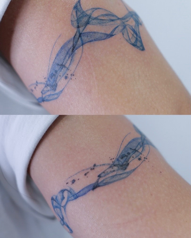 Tattoo by @dowha.tt — watercolor, fine_line