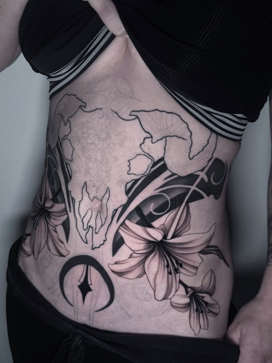 Tattoo by @kambria.tattoo — black_and_grey, realism