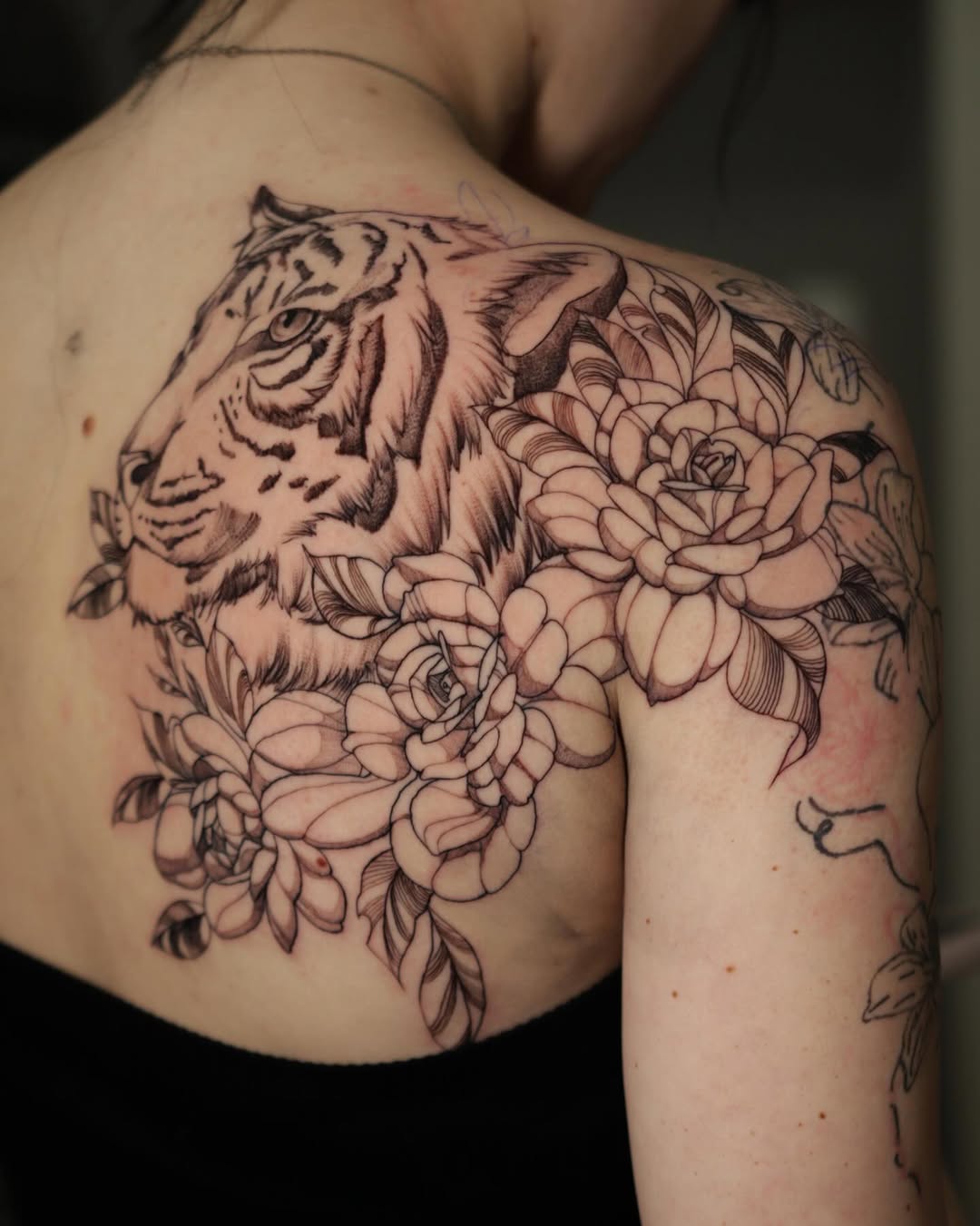 Tattoo by @cordero.inks — black_and_grey, realism