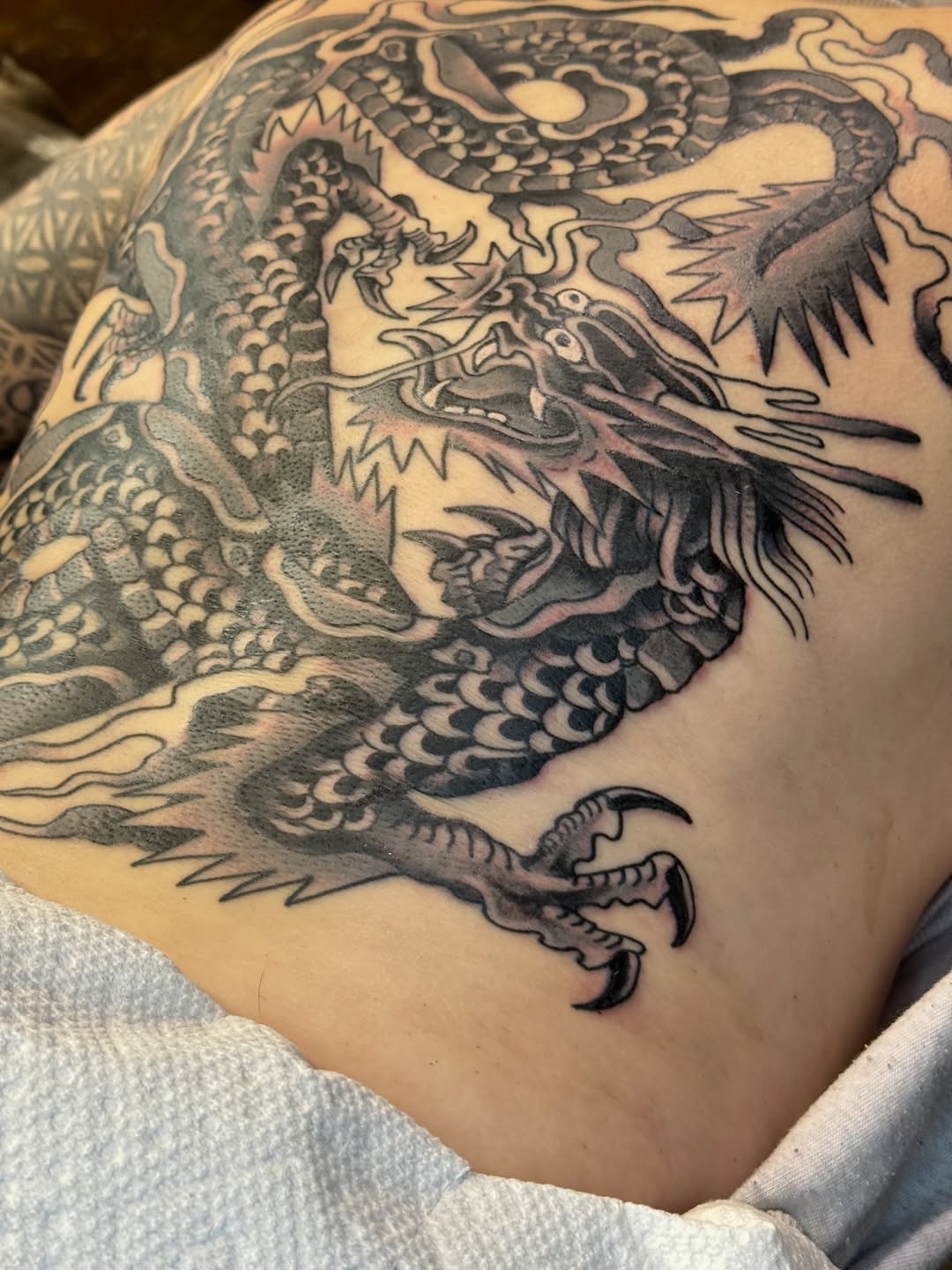 Tattoo by @inkcmob — japanese_irezumi, black_and_grey
