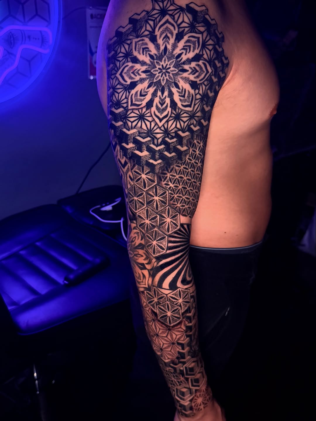 Tattoo by @pikashi_tattoos — geometric, dotwork
