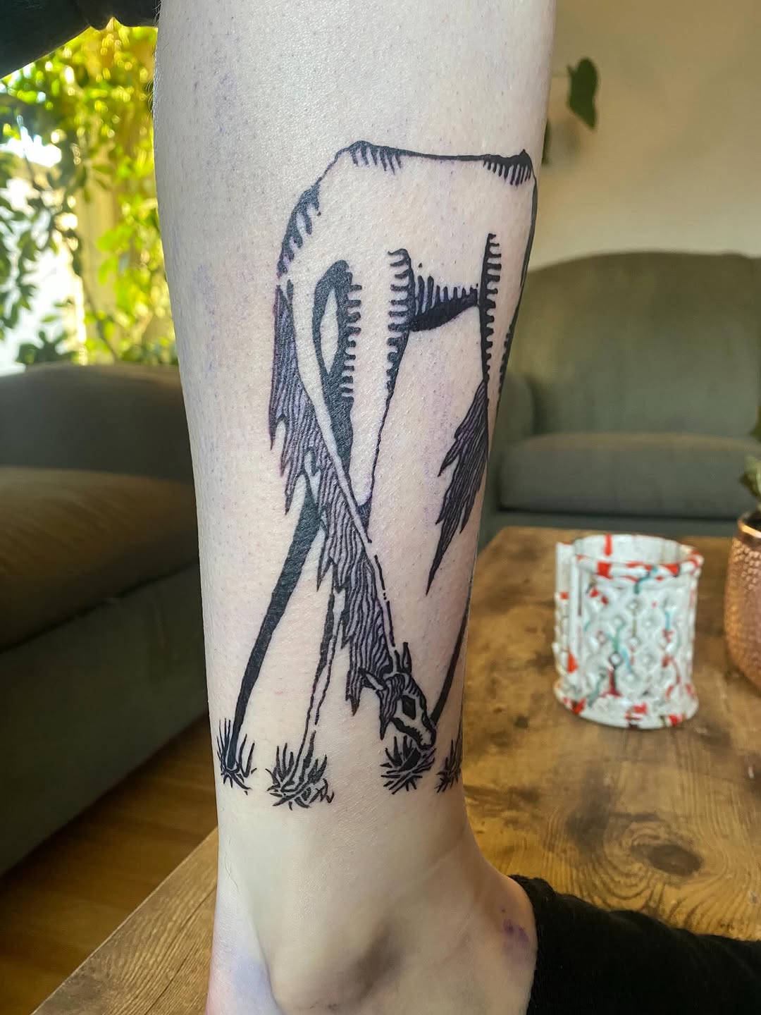 Tattoo by @littleblackdogtattoo — illustrative, blackwork