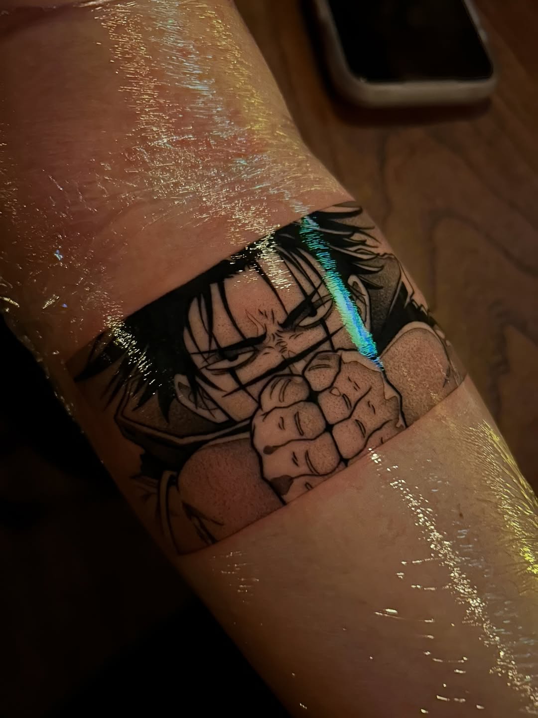 Tattoo by @kevin.tatt — anime, black_and_grey