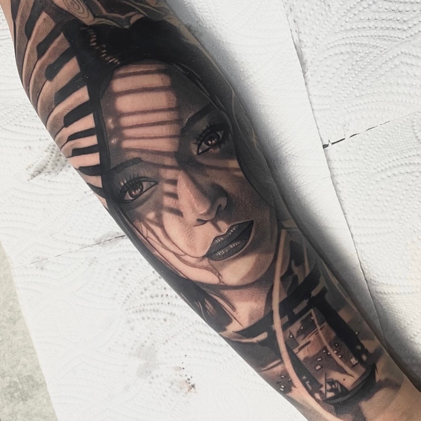 Tattoo by @vudi_tattoo — realism, black_and_grey