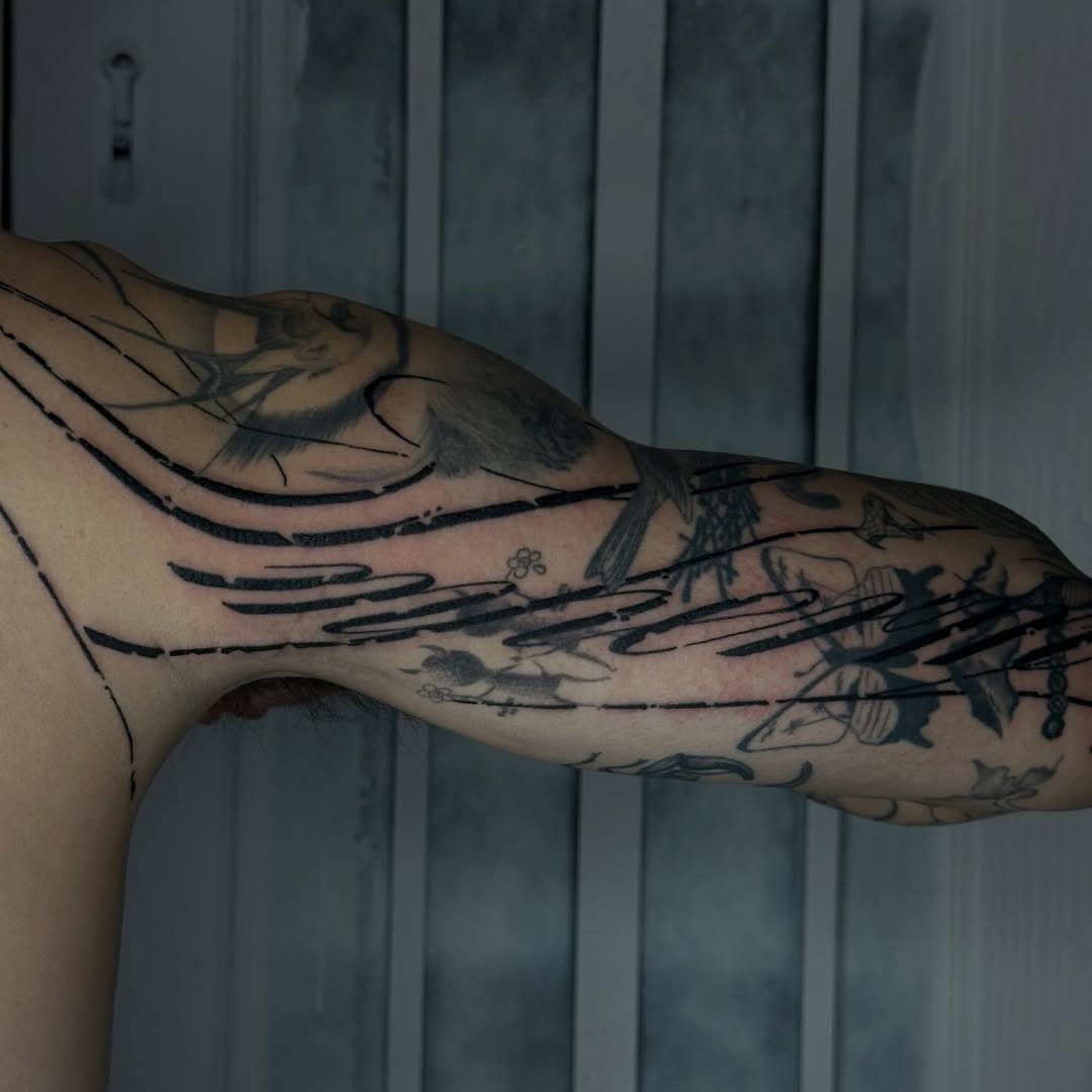 Tattoo by @good.boi.ink — blackwork, illustrative