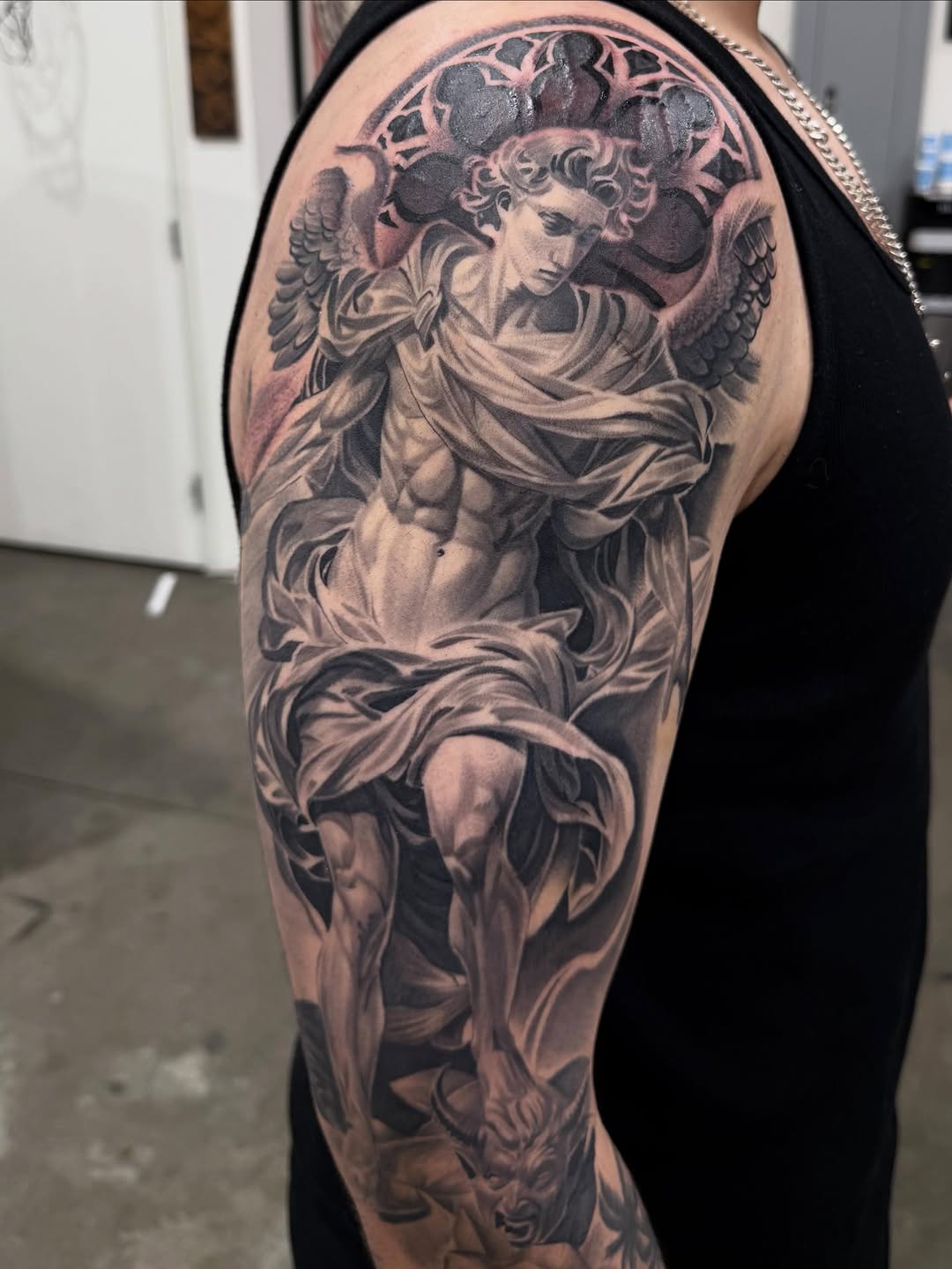 Tattoo by @tattoo_isaac562 โ realism, black_and_grey