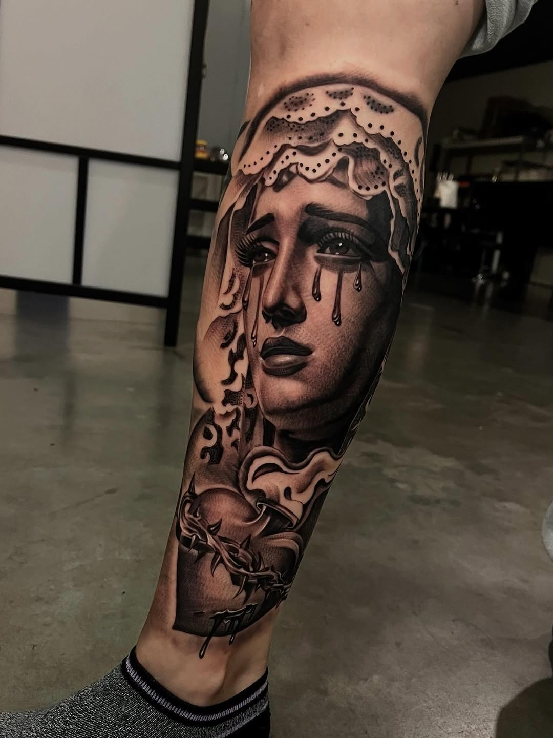 Tattoo by @tattoo_isaac562 โ realism, black_and_grey