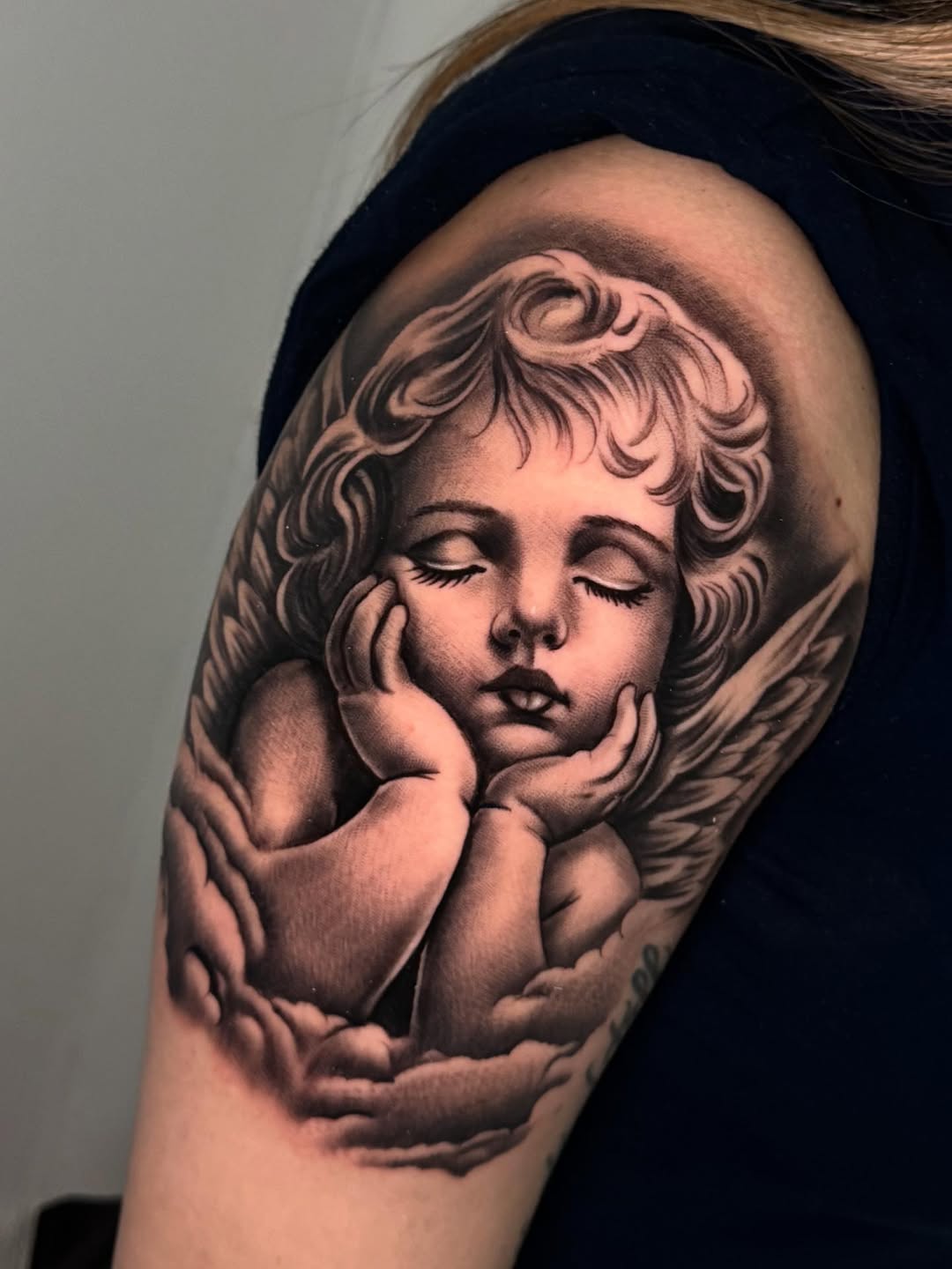 Tattoo by @saeso___ — realism, black_and_grey