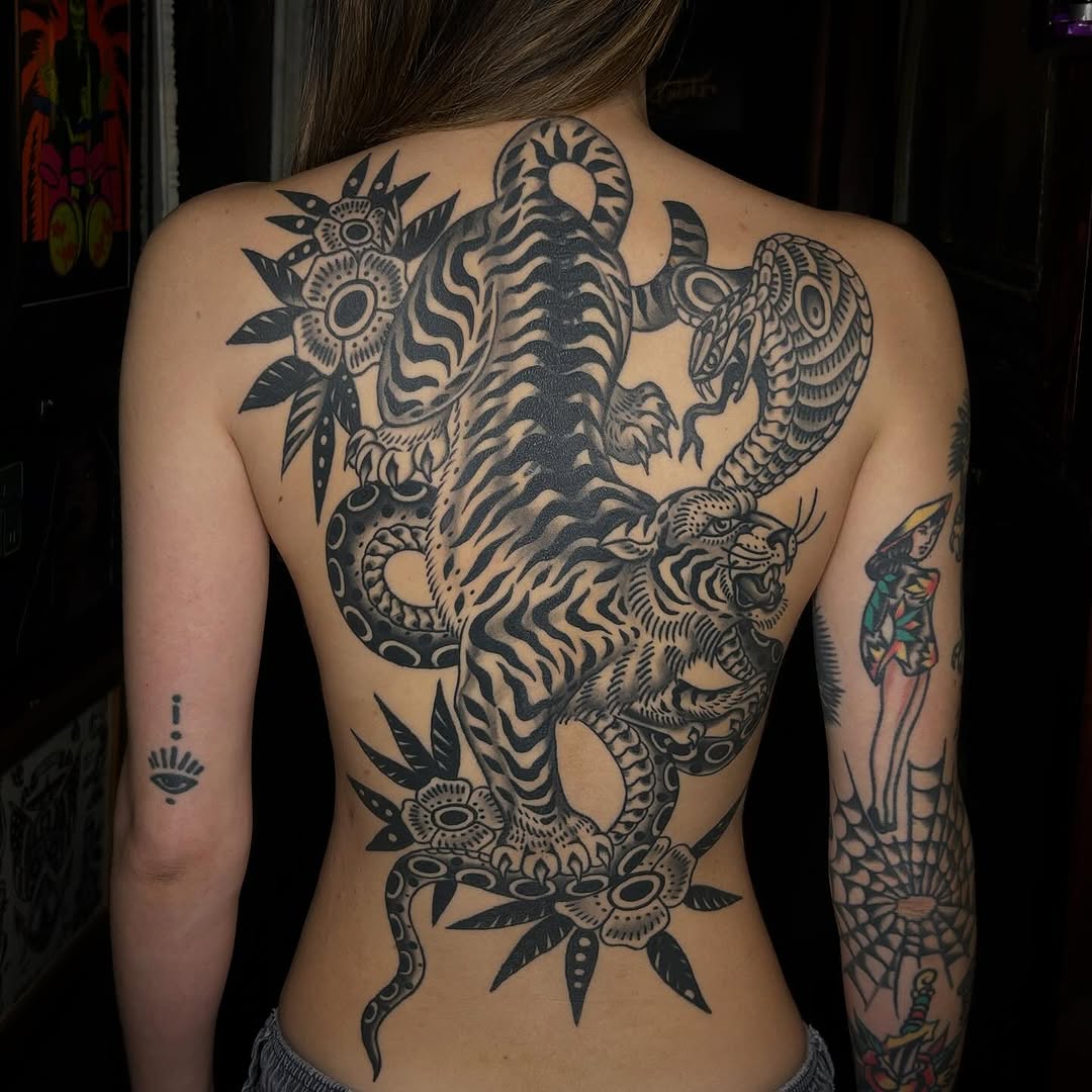 Tattoo by @hollydanesi โ american_traditional, blackwork