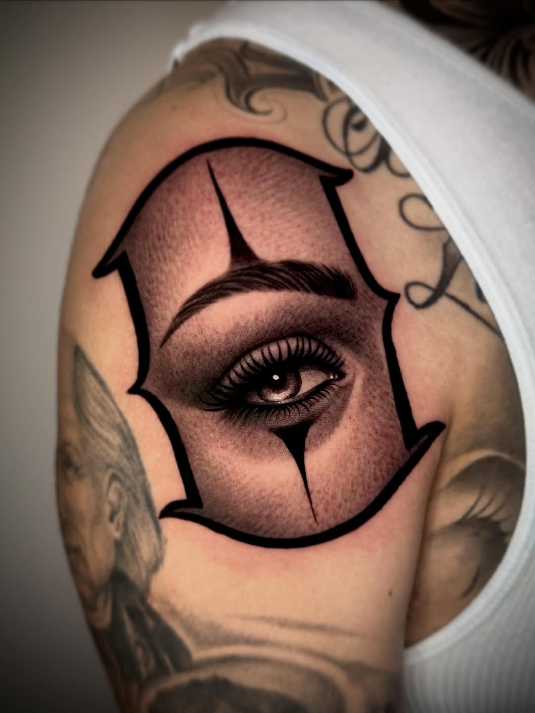 Tattoo by @tatts_by_t โ realism, black_and_grey