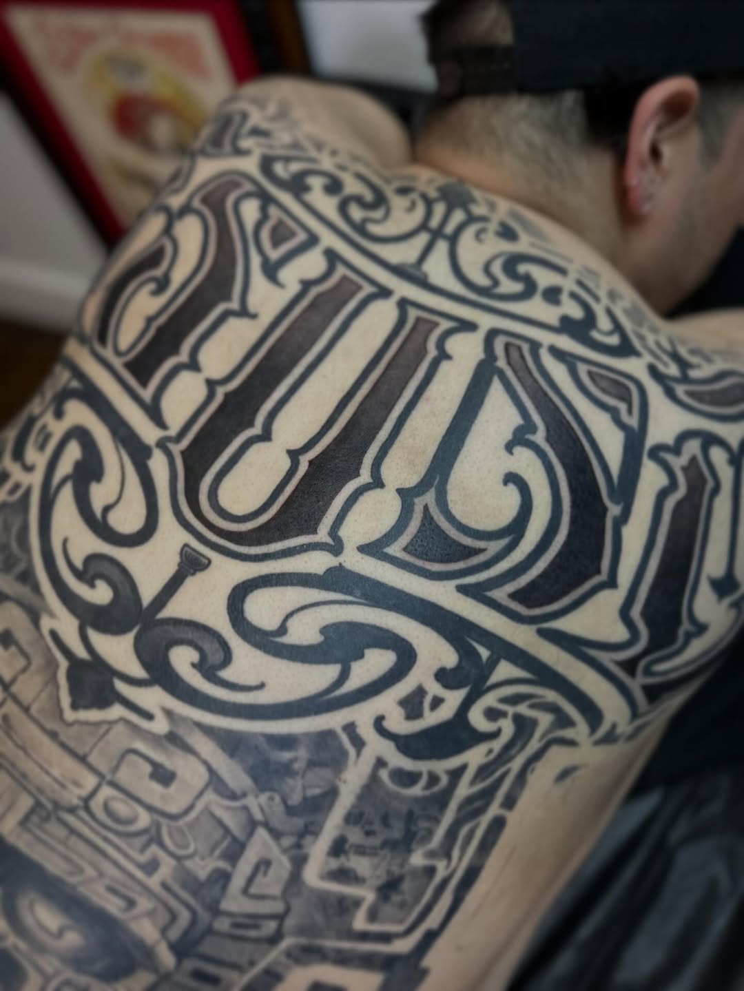 Tattoo by @deft_ink — lettering_script, blackwork
