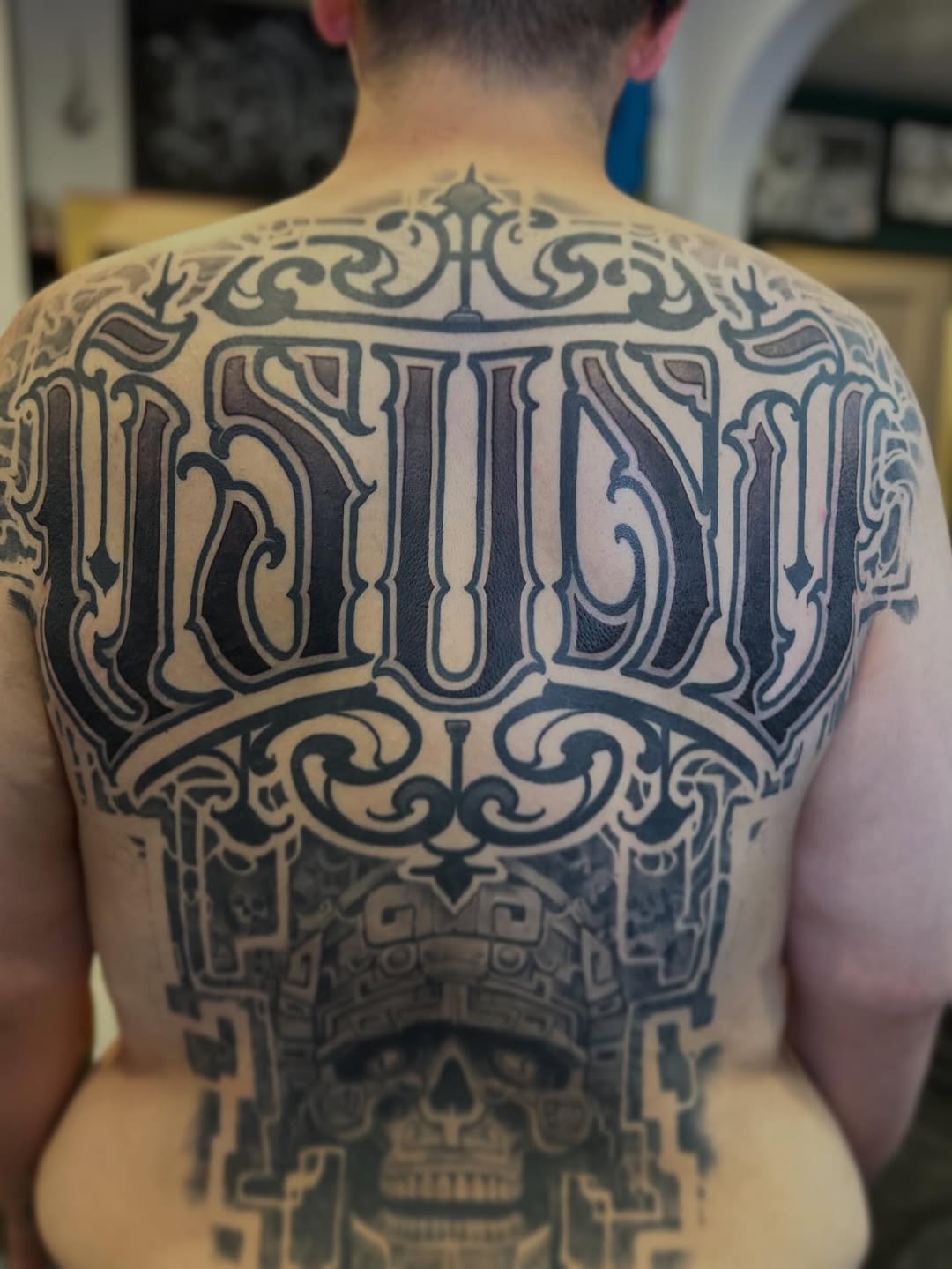Tattoo by @deft_ink — lettering_script, blackwork