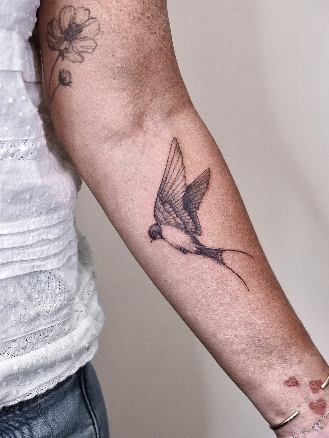 Tattoo by @ariana_tattooing — fine_line, black_and_grey