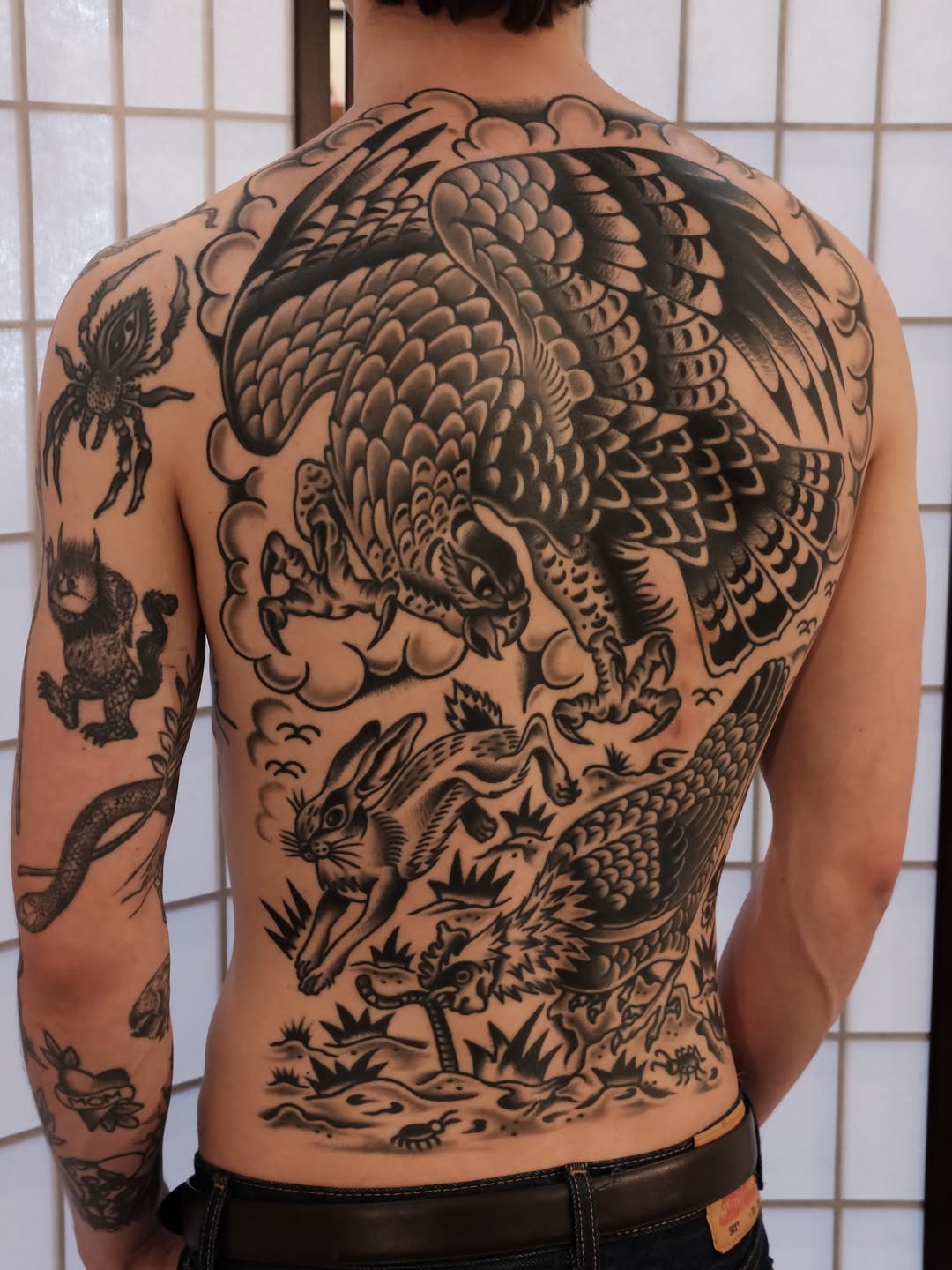 Tattoo by @rempetattoo โ japanese_irezumi, black_and_grey