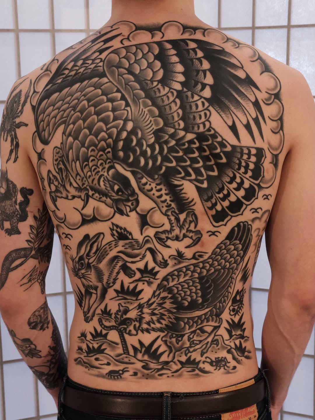 Tattoo by @rempetattoo โ japanese_irezumi, black_and_grey
