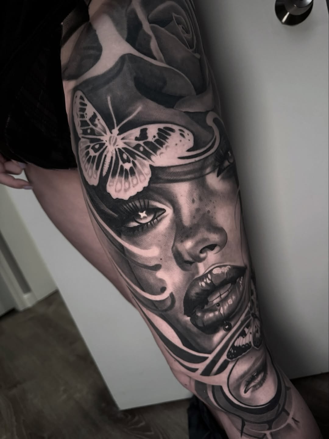 Tattoo by @kambria.tattoo — realism, black_and_grey