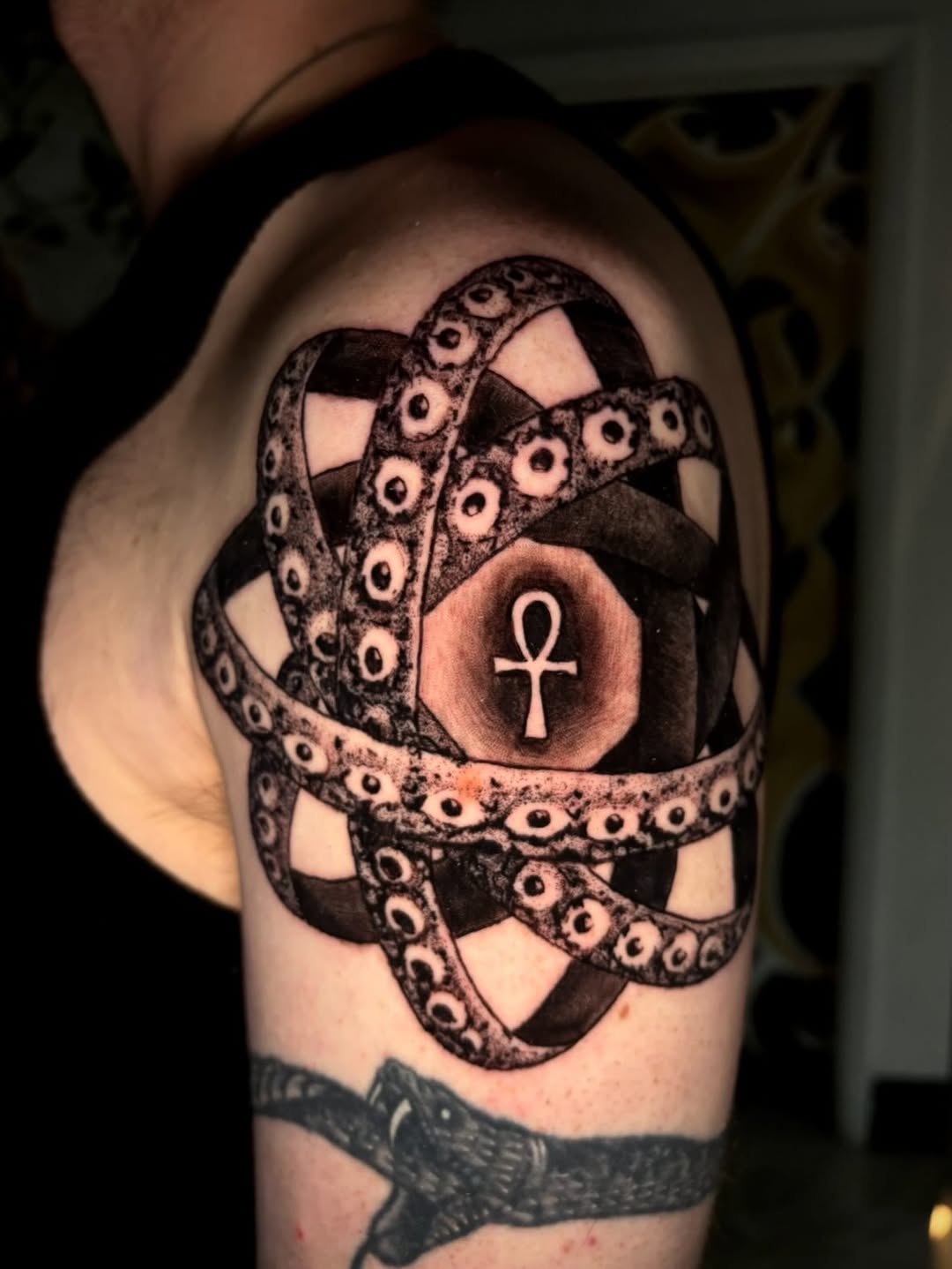 Tattoo by @cryptid.tattoo — black_and_grey, dark_realism