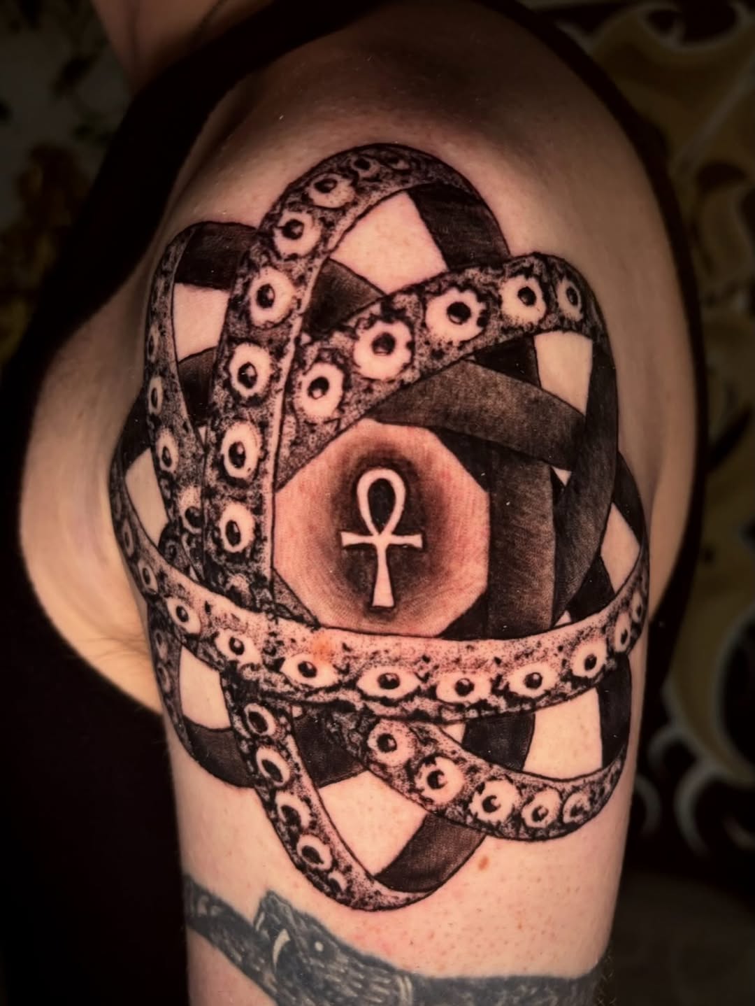 Tattoo by @cryptid.tattoo — black_and_grey, dark_realism