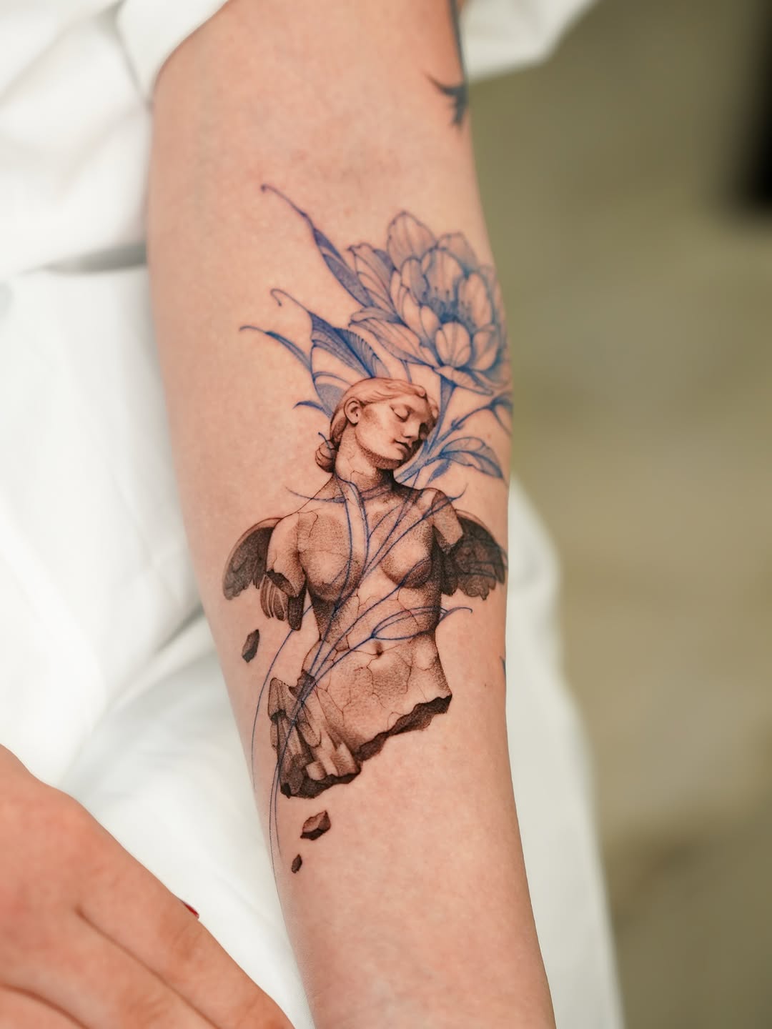 Tattoo by @tinnasole โ realism, fine_line