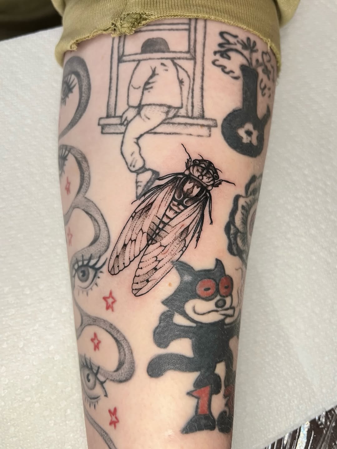 Tattoo by @__ink.doll__ — black_and_grey, illustrative