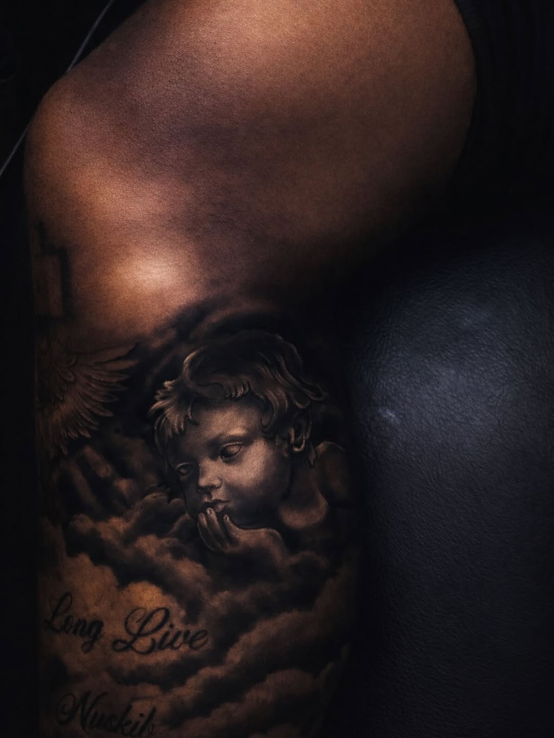 Tattoo by @el_maui787 — realism, black_and_grey