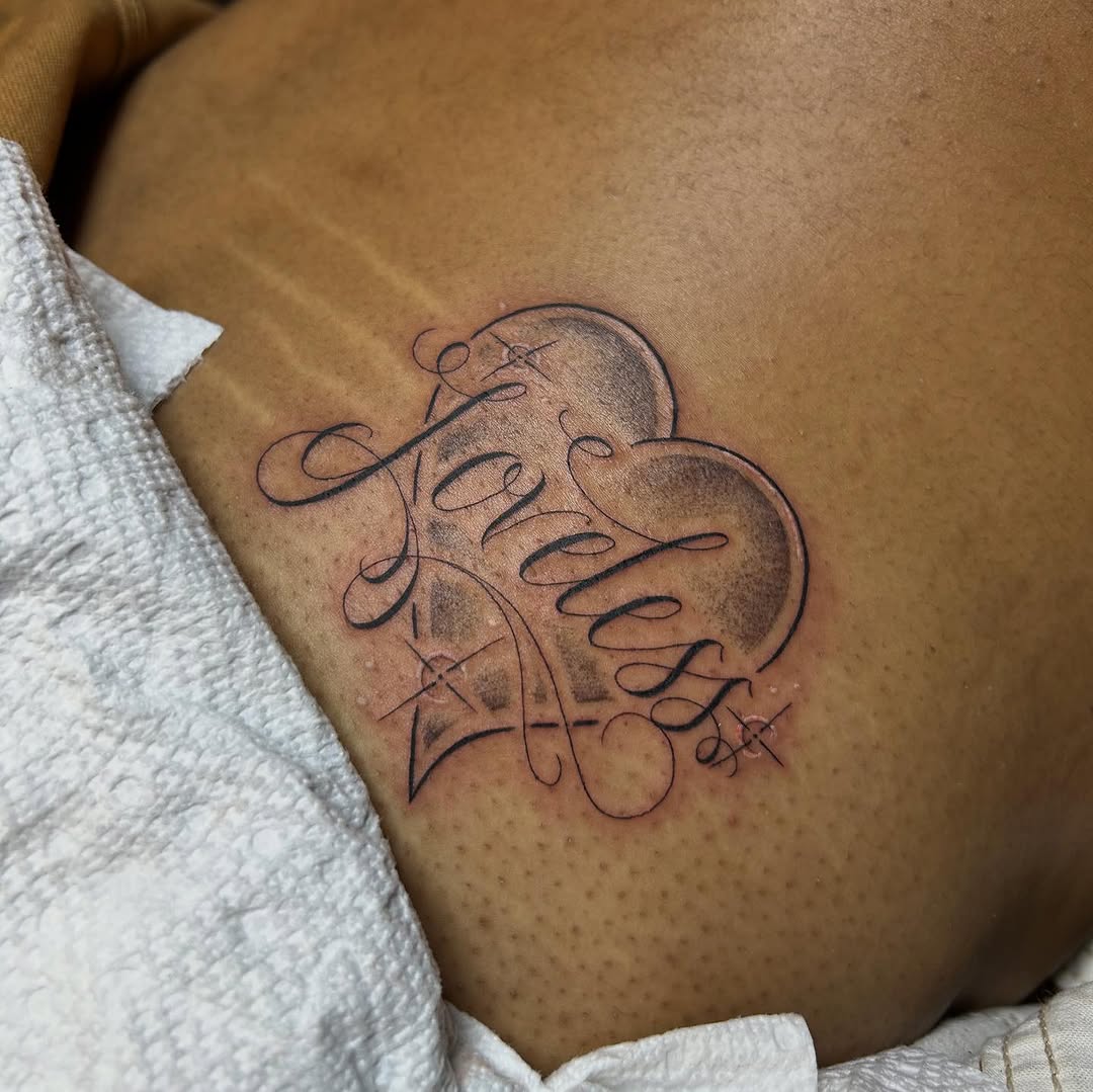 Tattoo by @tats.by.yana โ lettering_script, black_and_grey