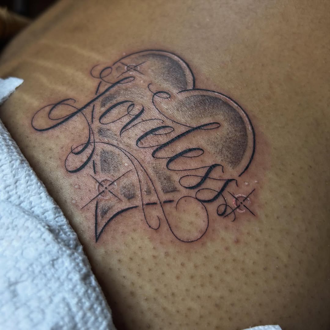 Tattoo by @tats.by.yana โ lettering_script, black_and_grey