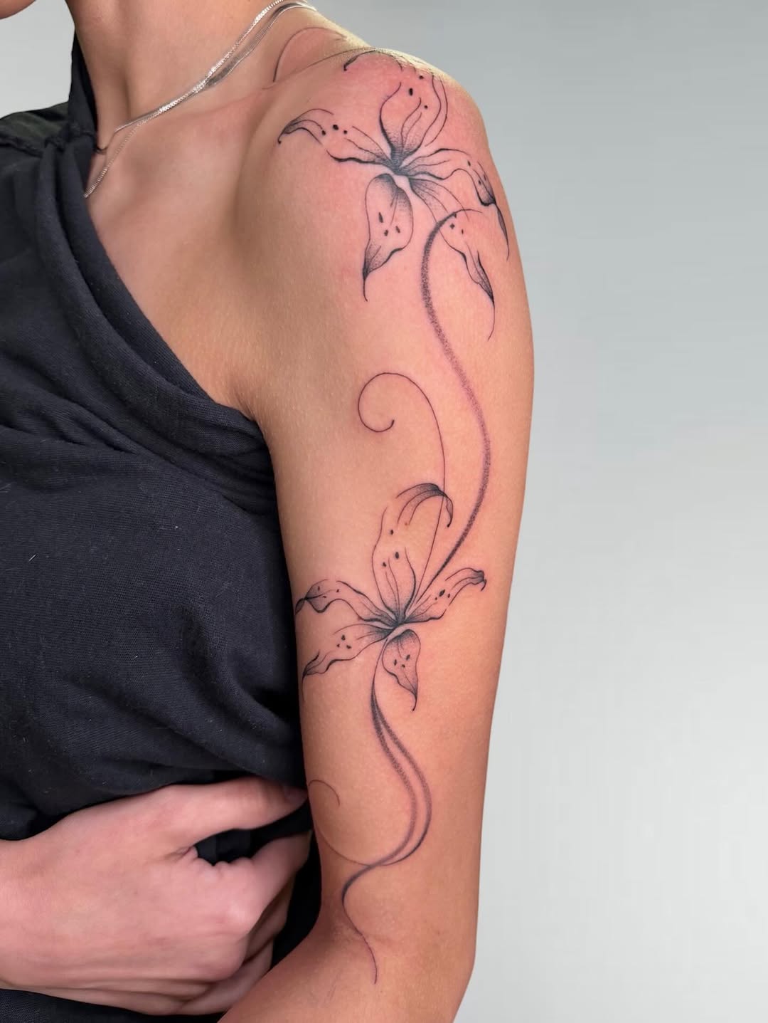 Tattoo by @kaylas.ink — fine_line, black_and_grey