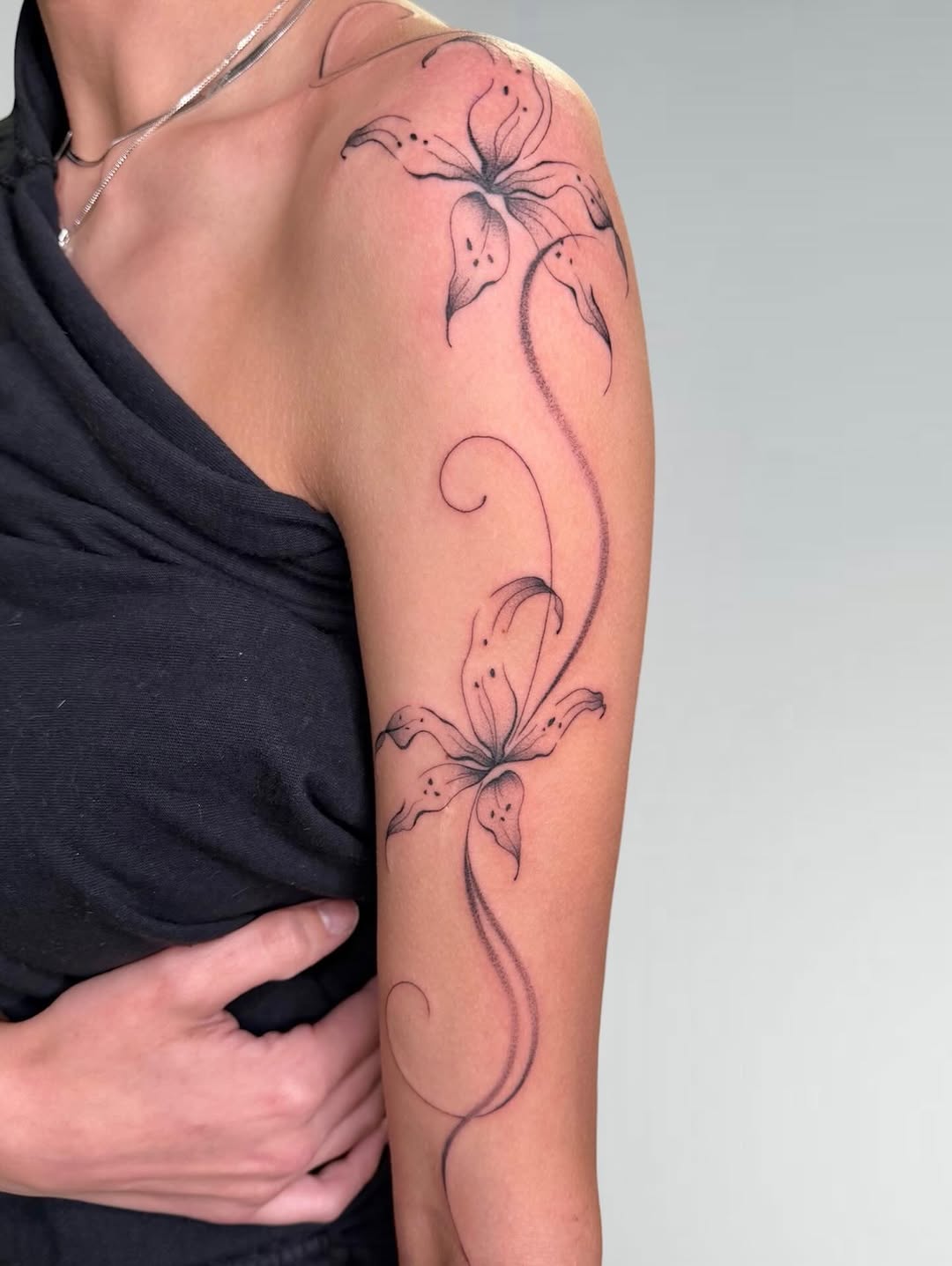 Tattoo by @kaylas.ink — fine_line, black_and_grey