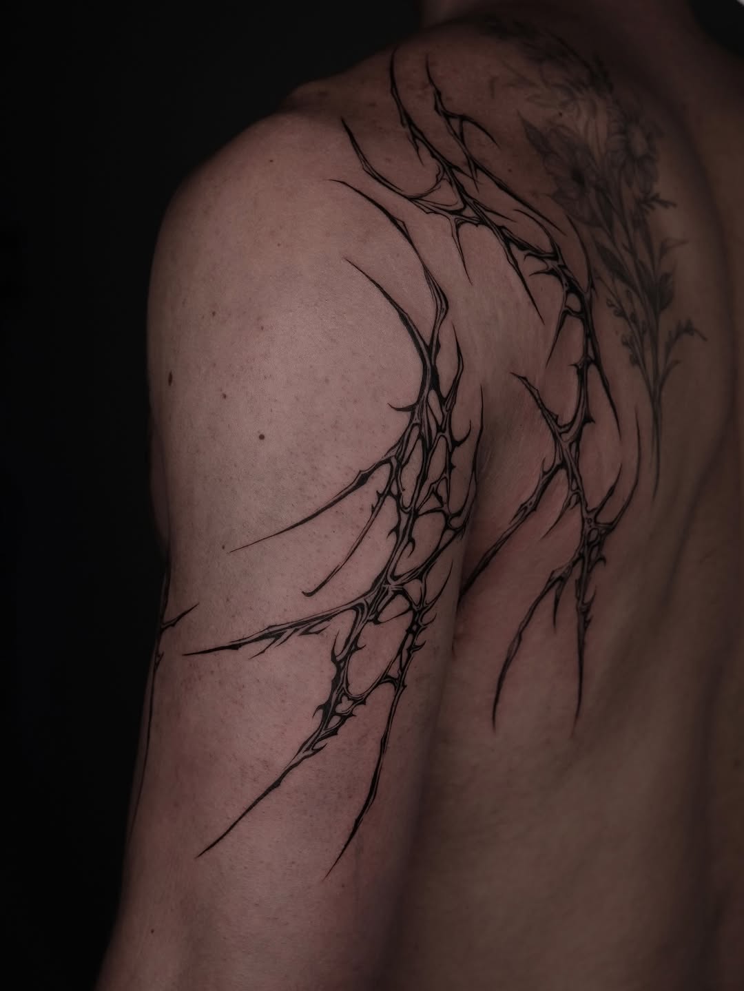 Tattoo by @grxytattoo — blackwork, geometric