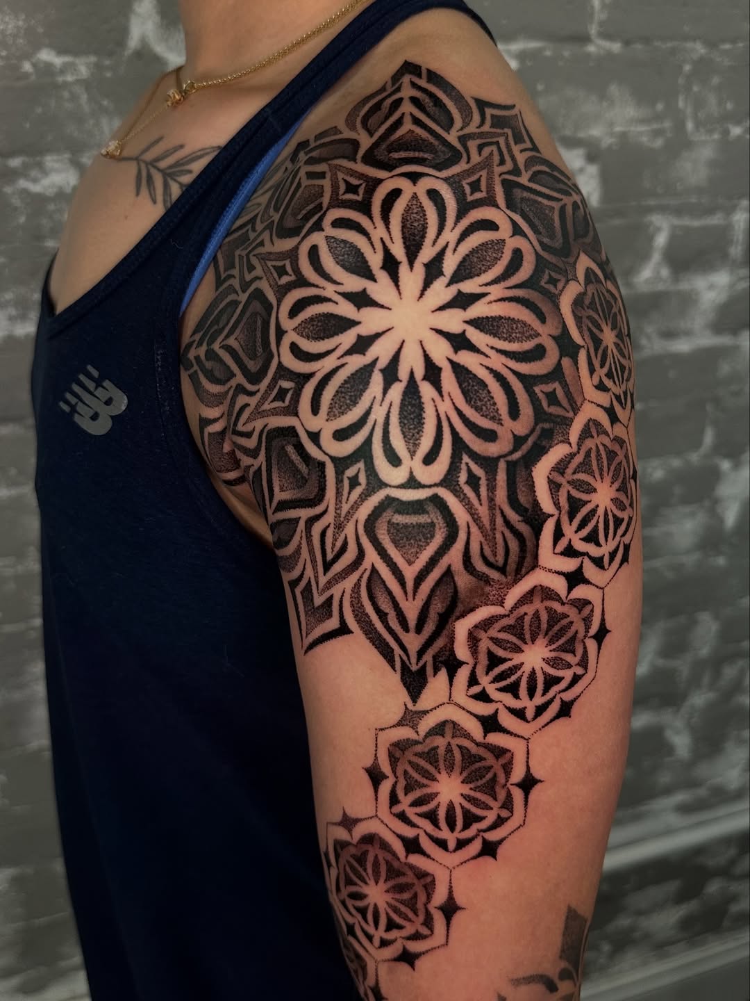 Tattoo by @dayana_tattooartist — geometric, dotwork