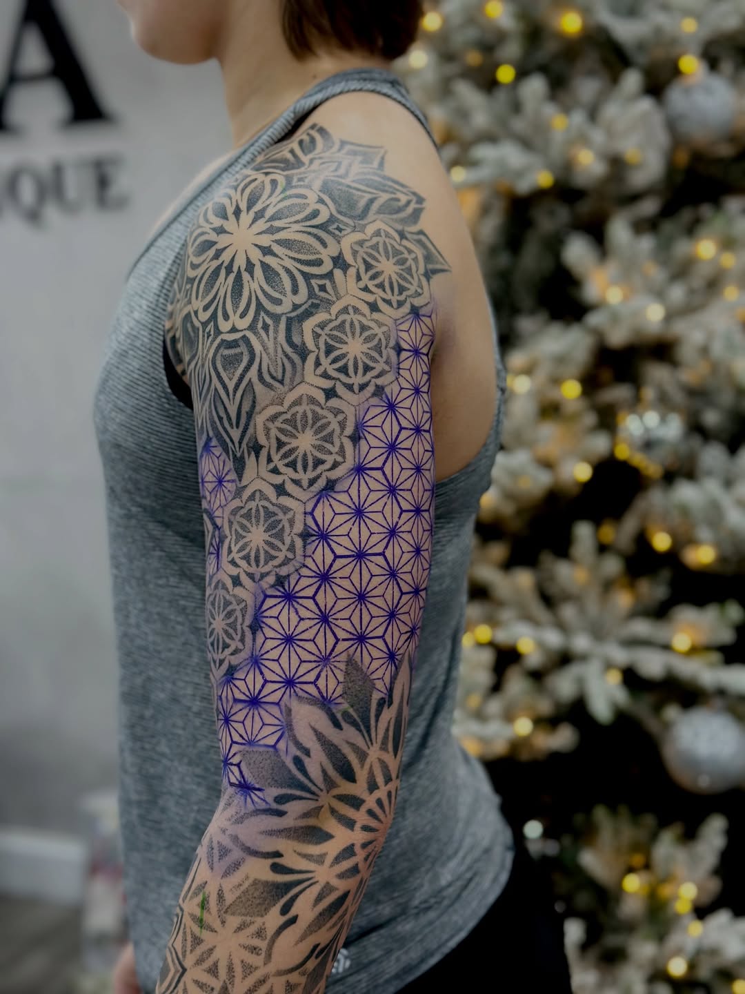 Tattoo by @dayana_tattooartist — geometric, dotwork