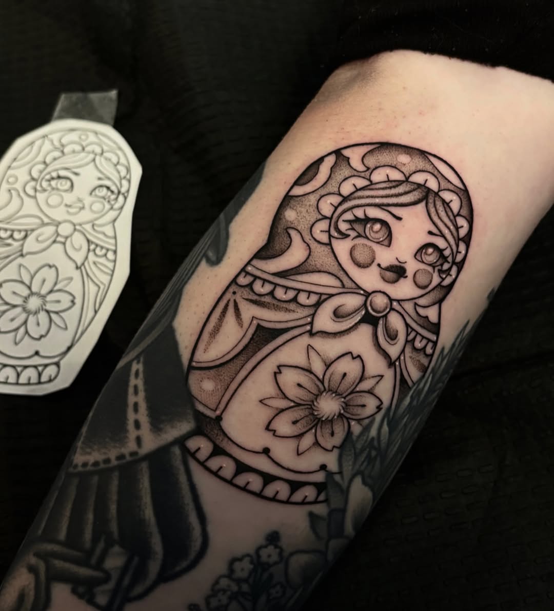 Tattoo by @strangegraves.ink — illustrative, black_and_grey