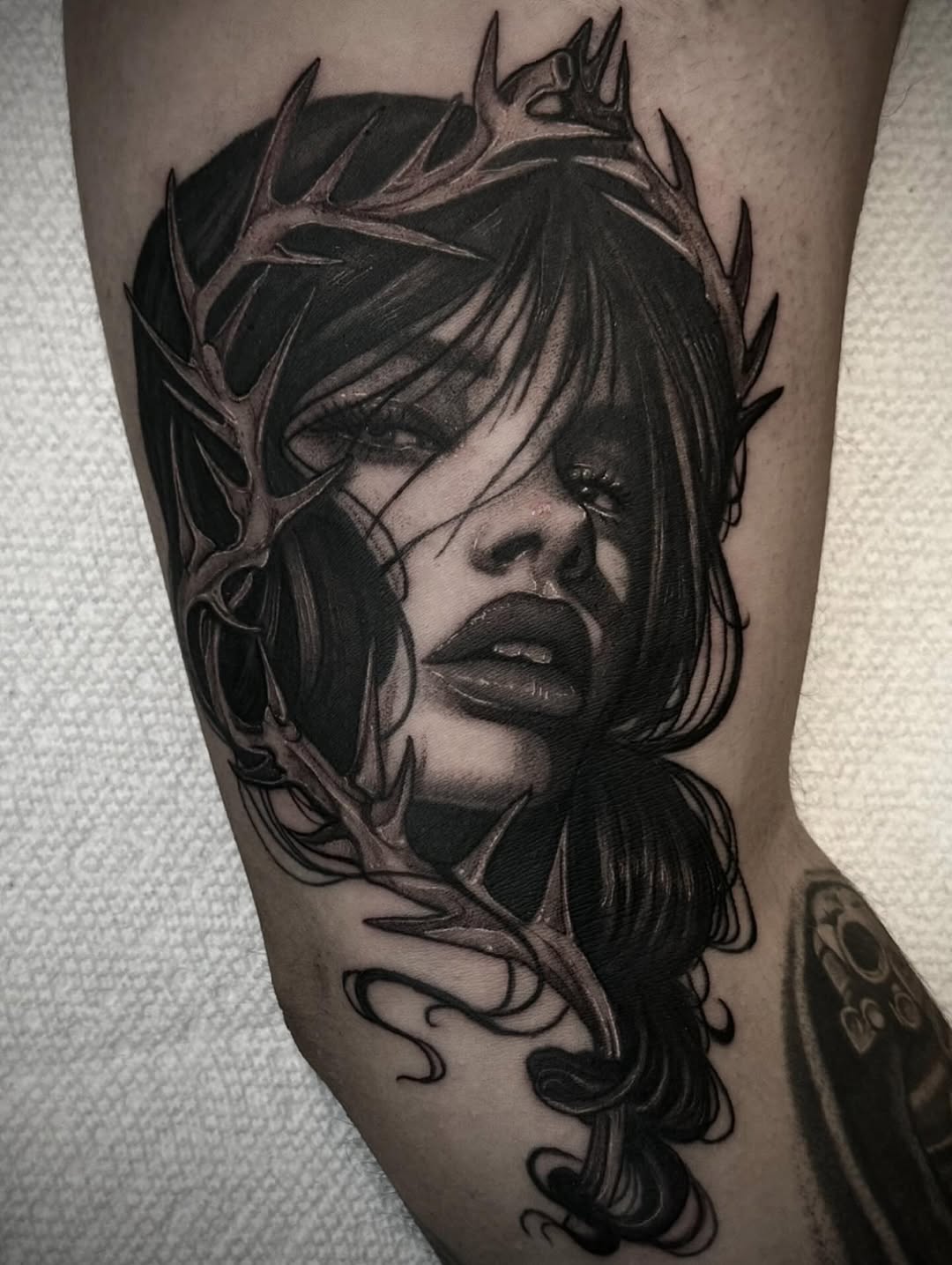 Tattoo by @machomandisavage — dark_realism, black_and_grey