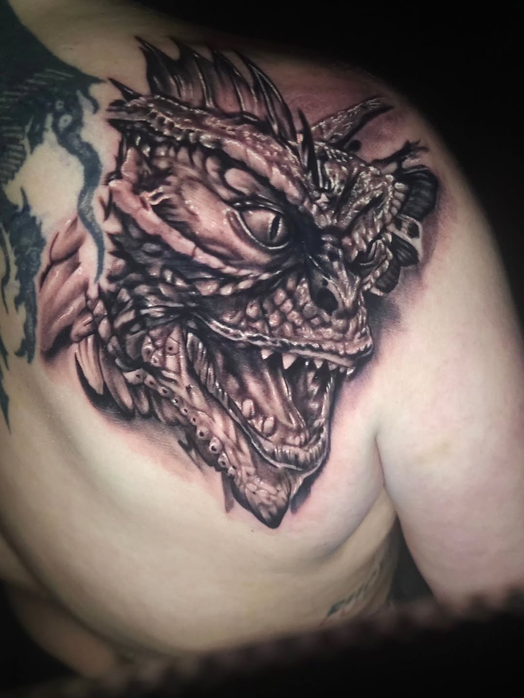 Tattoo by @fromthefiretattoo605 — realism, black_and_grey