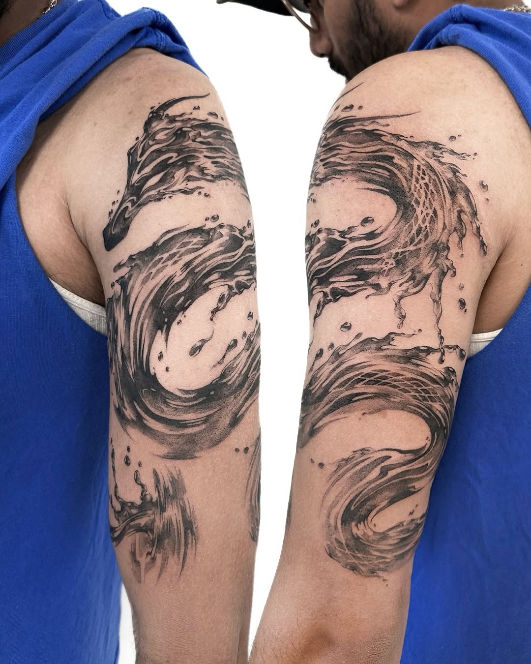 Tattoo by @uzo.ink — black_and_grey, realism