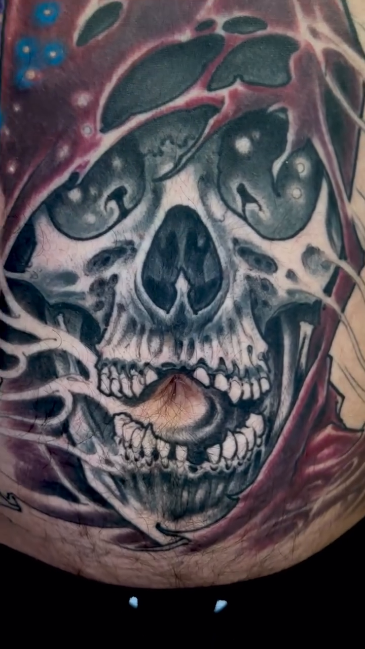 Tattoo by @jesse_c_roberts — dark_realism, black_and_grey