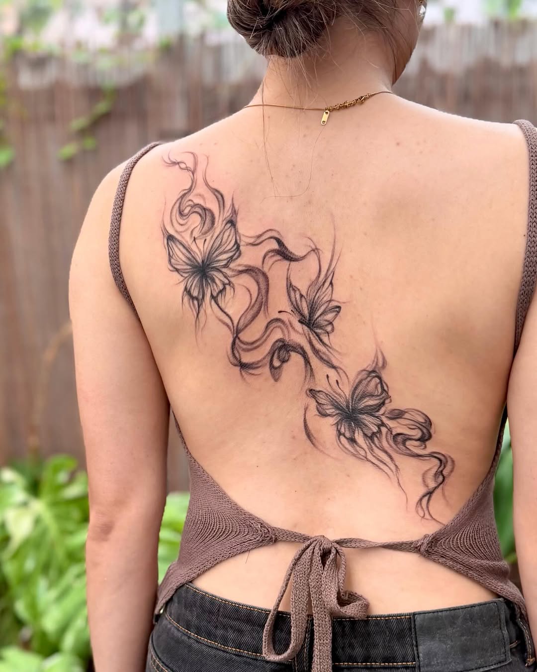 Tattoo by @nganvu.tattoo — fine_line, black_and_grey