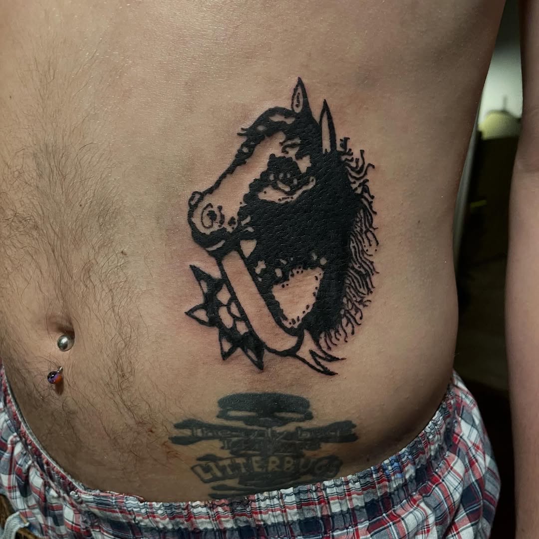 Tattoo by @emotionalthugtattoo — blackwork
