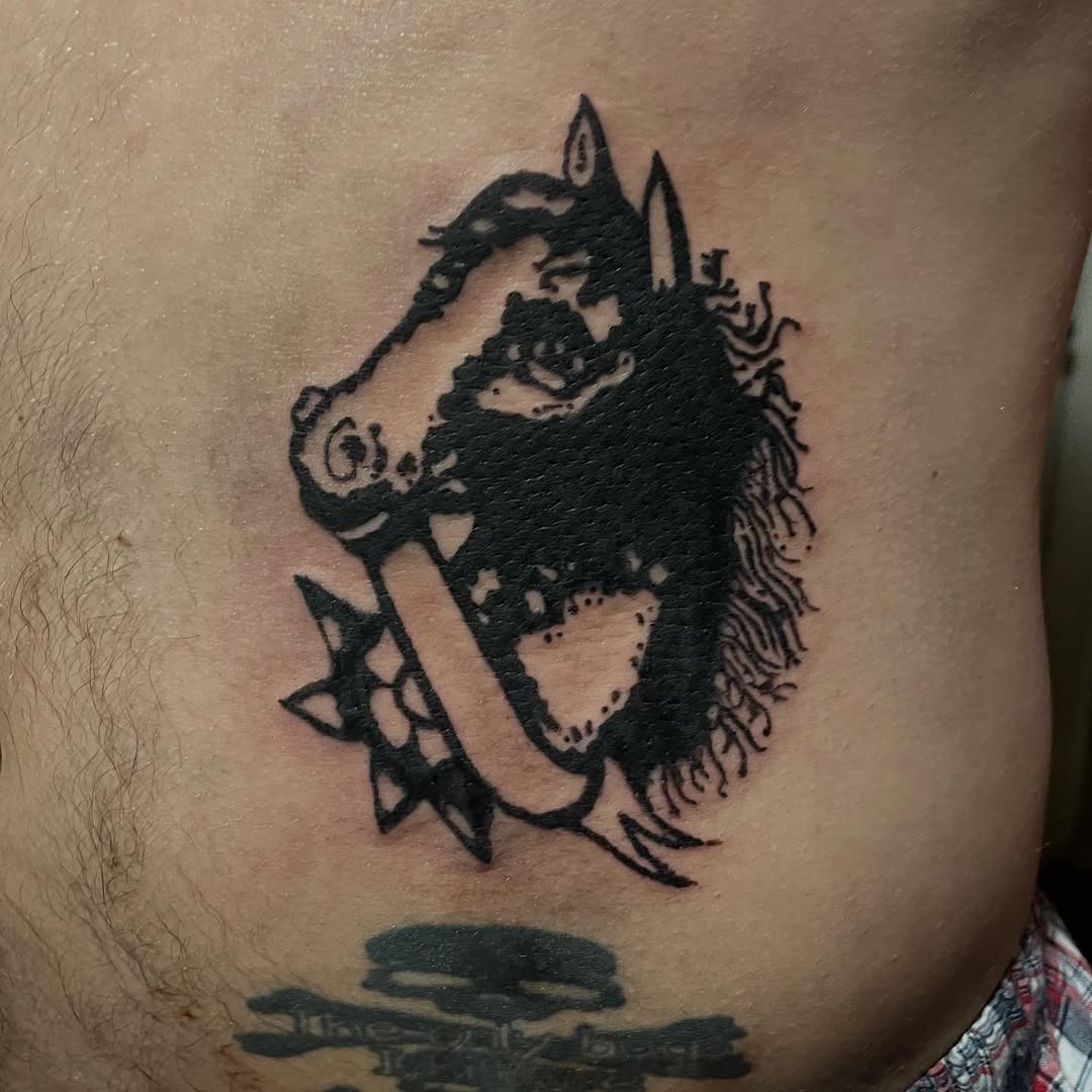 Tattoo by @emotionalthugtattoo — blackwork