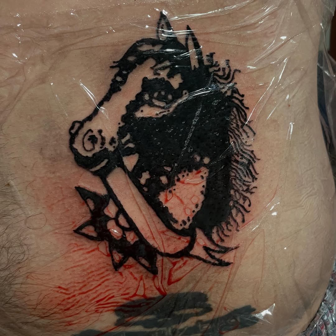 Tattoo by @emotionalthugtattoo — blackwork